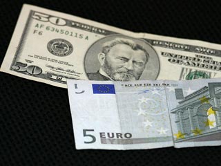 Доллар вырос на 3 копейки, евро подешевел на 13