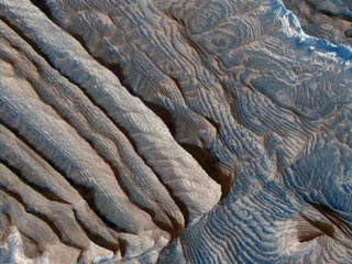 На Марсе некогда существовал огромный океан, который покрывал треть всей планеты, полагают американские ученые.