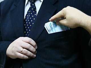 Коррупция обходится России в треть ВВП