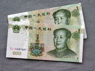 Китайский юань может планово подорожать во втором квартале 2010 года
