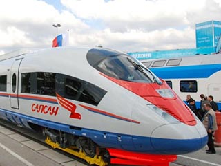 РЖД сообщили, что за два полных месяца с момента выхода на линию Москва-Петербург немецкий высокоскоростной поезд "Сапсан" перевез 165,9 тысяч пассажиров, коммерческая загрузка поезда составила 83,2%