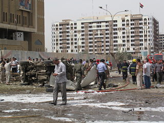 Число жертв взрывов, которые произошли в воскресенье утром в центральной части Багдада, возросло до 30