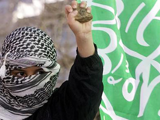 Мятежное исламистское движение "Хамас", контролирующее сектор Газа, в воскресенье одобрило решение Исполкома ООП и своих соперников из движения "Фатх" остановить переговоры с Израилем при продолжении поселенческой деятельности