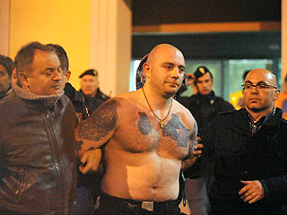Организаторы беспорядков в Генуе были арестованы по возвращении в Сербию