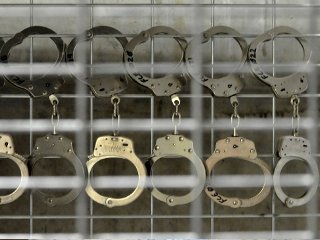 Сумма компенсаций, выплачиваемых правительством Великобритании 16-ти бывшим заключенным американской тюрьмы в Гуантанамо, не будет предана огласке, заявил министр юстиции Соединенного Королевства