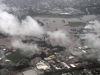 В результате наводнения, от которого продолжает страдать северо-восток Австралии, может быть затоплено около 20 тысяч домов