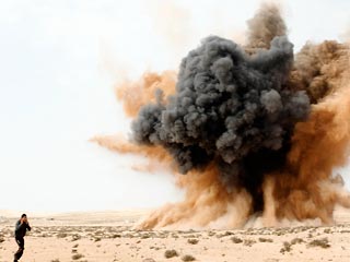 Авиация Каддафи снова бомбит отбитый повстанцами город Брега и объекты в Адждабии