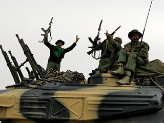 Войска Каддафи вошли в восточные кварталы Бенгази, прорвав линию обороны повстанцев
