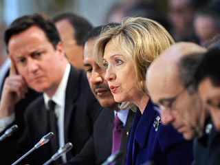Участники Лондонской конференции по Ливии договорились ужесточать с санкции и послать к Каддафи гонца 