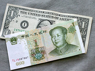 Китайский юань поднялся до рекордной отметки по отношению к доллару
