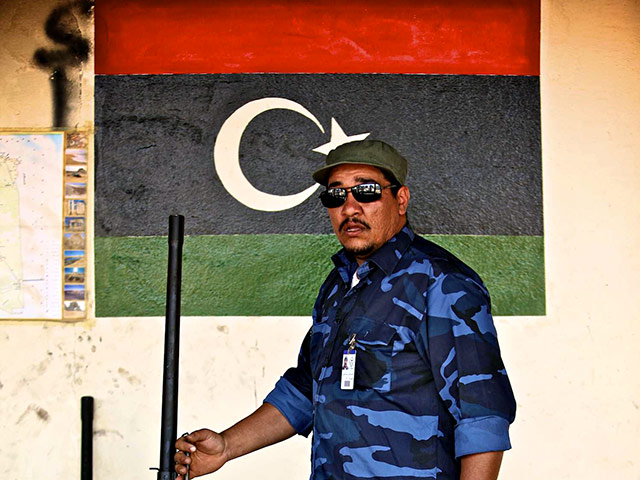 Германия признала так называемый "Переходный национальный совет" (ПНС), сформированный вооруженными противниками ливийских властей, законным правительством этой страны