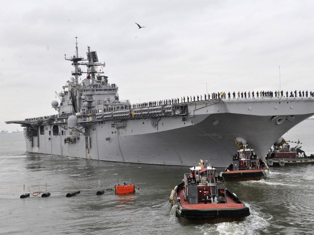 Американское военное командование приказало 2-му флоту ВМС США подготовиться к выводу своих кораблей в открытое море в связи с приближением урагана "Айрин"