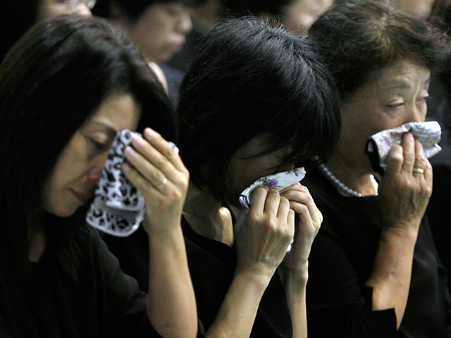 В Японии минутой молчания почтили память погибших в результате землетрясения и цунами 11 марта