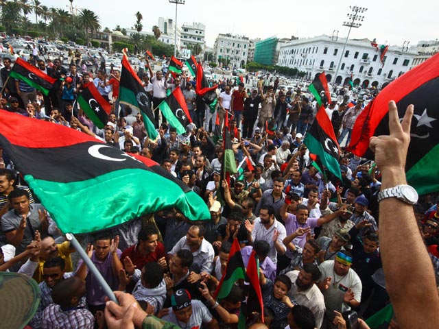 Пресса и эксперты пытаются определить, закончилась ли после гибели свергнутого ливийского лидера Муаммара Каддафи гражданская война в этой африканской стране
