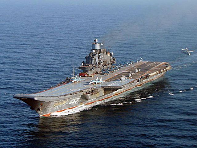 Корабельная авианосная группа Северного флота России в составе тяжелого крейсера "Адмирал Кузнецов" и большого противолодочного корабля "Адмирал Чабаненко" отправятся в двухмесячный поход в Средиземное море с заходом в сирийский порт Тартус 6 декабря