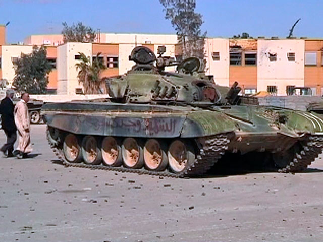 Сторонники покойного лидера Ливии Муаммара Каддафи прекратили сопротивление в городе Бани-Валиде, который пару дней назад взяли под контроль