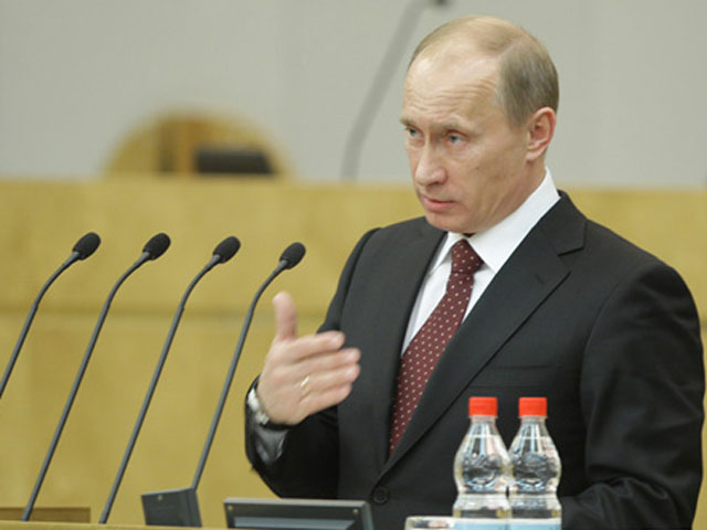 Российский премьер Владимир Путин выступает перед Госдумой с завершающим отчетом о четырехлетней работе своего правительства, которое должно обновиться после 7 мая