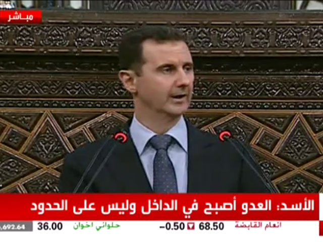 Асад пришел в сирийский парламент: страна должна противостоять кризису, а не бежать от него