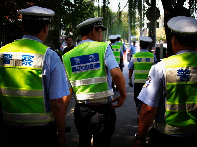 В Гуанчжоу (Южный Китай) арестованы 18 человек, предположительно совершавших "насильственные действия" в ходе антияпонских выступлений в минувшие выходные