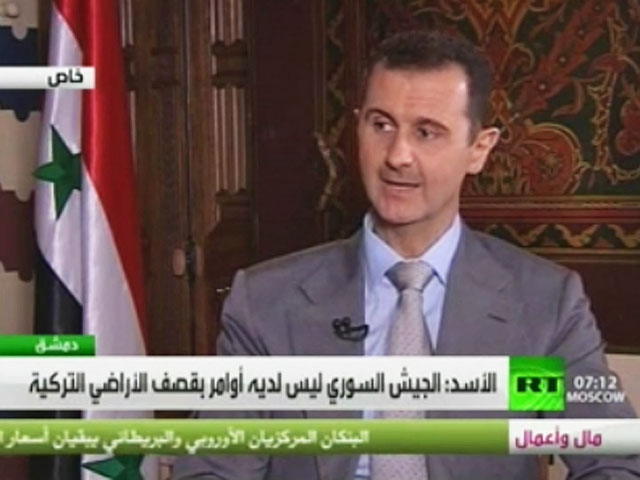 На Западе после интервью Асада RT предсказывают сценарии по свержению "нового Каддафи"