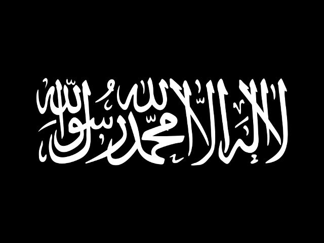 Участники акции держали в руках многочисленные черные и белые флаги с надписями на арабском "Нет бога, кроме Аллаха, и Мухаммед - его пророк"