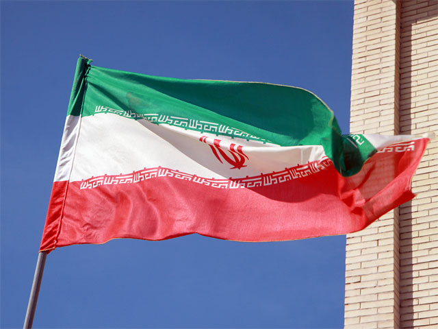 Накануне переговоров между Ираном и "шестеркой" по ядерной программе барельеф с изображением обнаженного мужчины у входа в один из залов Дворца Наций в Женеве прикрыли ширмой
