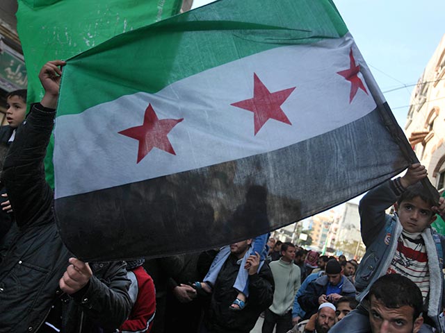 Сирийские оппозиционеры выдвинули ряд условий, при которых они не поедут на международную конференцию "Женева-2", среди них - присутствие на мероприятии делегации Ирана