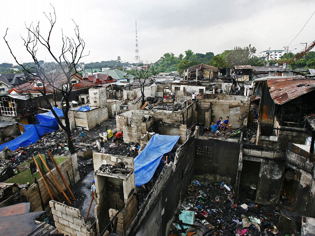 Около 10 тысяч человек погибли в результате супертайфуна "Хайян", пронесшегося по Филиппинам