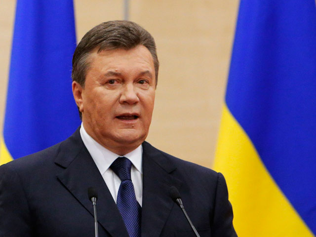 Бывший президент Украины Виктор Янукович, настаивающий на своей легитимности, готовился к отъезду из своей резиденции в Межигорье заранее