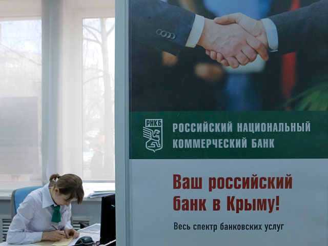 В Крыму идет массовое закрытие украинских банков. Отделения большинства банков закрыты, банкоматы практически не работают