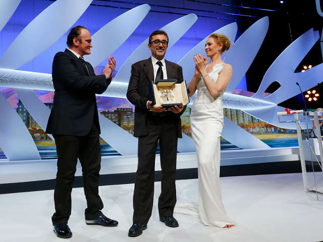 Награду победителю вручили Ума Турман и Квентин Тарантино.
