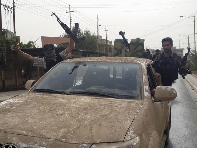 Боевики группировки "Исламское государство Ирака и Леванта", Мосул, 12 июня 2014 года