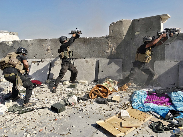 Подразделения армии и сил безопасности Ирака уничтожили в четверг десятки боевиков движения "Исламское государство Ирака и Леванта" (ИГИЛ) в окрестностях Багдада и на севере страны