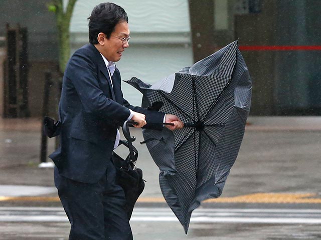 Сильнейшие ливни и град обрушились на Токио и прилегающие районы во вторник днем, 24 июня
