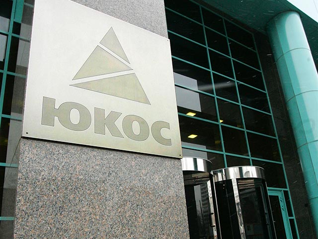 На следующей неделе Россия узнает, придется ли ей платить за за нефтяную компанию ЮКОС, отнятую у ее владельцев 10 лет назад