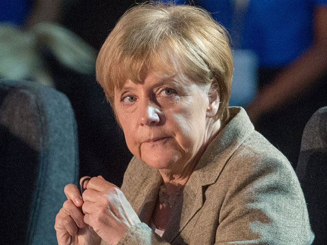 Меркель пообещала снять с России санкции, когда на Украине наступит мир