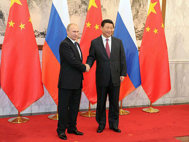 В ходе переговоров российской делегации, которую возглавляет президент Владимир Путин, с лидером Китая Си Цзиньпином, которые состоялись перед форумом АТЭС, был подписан "огромный пакет документов"