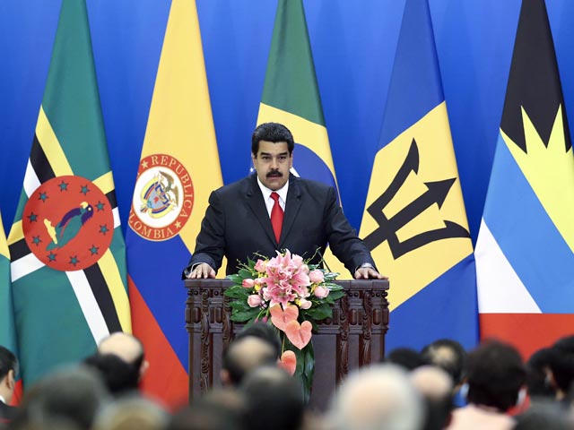 Американская пресса резко раскритиковала президента Венесуэлы Николаса Мадуро за то, что он вместо борьбы с острым кризисом, охватившим его страну на фоне падающих цен на нефть, разъезжает по миру