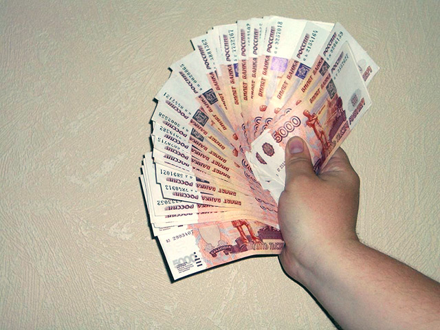 Количество поддельных 5-тысячных банкнот, выявленных в банковской системе РФ в 2014 году, увеличилось на 71,3% - до 60,9 тыс