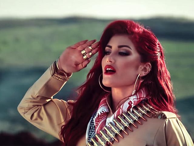 Живущая в США певица курдского происхождения Хелли Лав выпустила видео под названием Revolution, которое было воспринято как агитация против "Исламского государства"