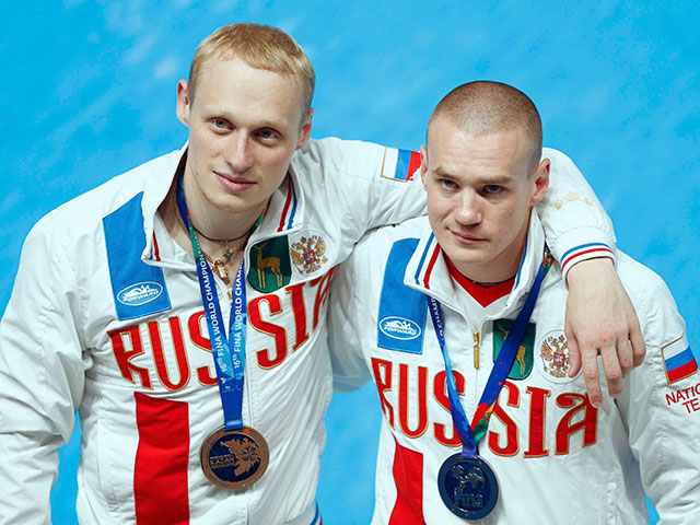 Российские прыгуны в воду Илья Захаров и Евгений Кузнецов выиграли серебряные медали чемпионата мира в Казани в синхронных прыжках с трехметрового трамплина