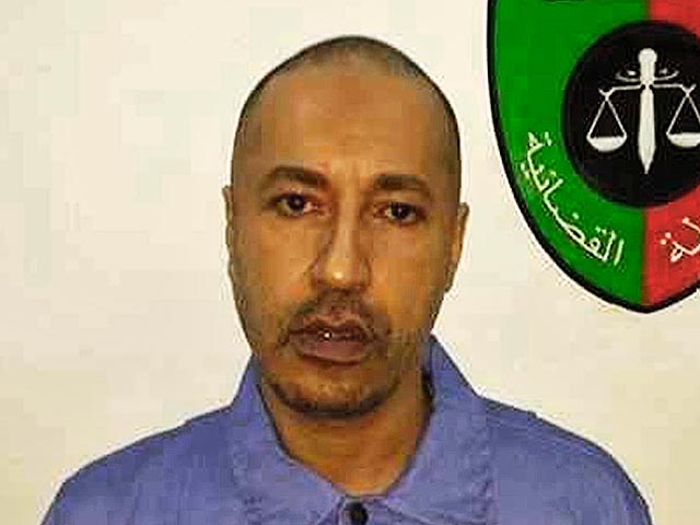 Прокуратура Ливии изучает появившийся на днях в Сети видеоролик, на котором, предположительно, сын бывшего ливийского лидера Муаммара Каддафи подвергается избиению в тюрьме в Триполи