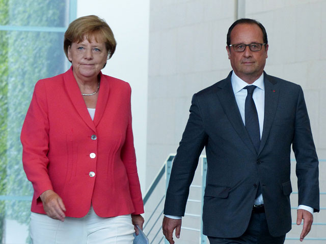 Президент Франции Франсуа Олланд и канцлер Германии Ангела Меркель согласовали меры по борьбе с наплывом мигрантов в Европу