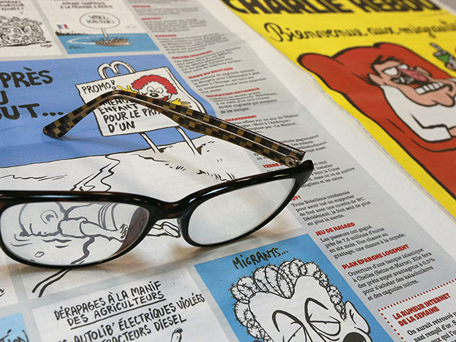 Журнал Charlie Hebdo продолжает публиковать скандальные карикатуры
