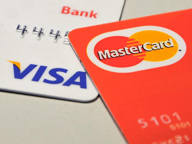 Международные платежные системы Visa и MasterCard перестали обслуживать карты еще нескольких российских банков