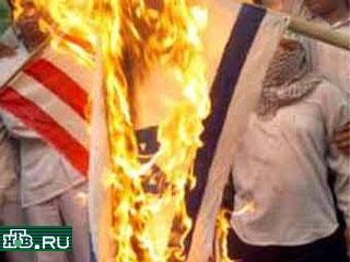 Участники митинга в Тегеране сожгли израильский и американский флаги
