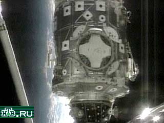 Двое из семи членов экипажа корабля Discovery вышли сегодня в открытый космос