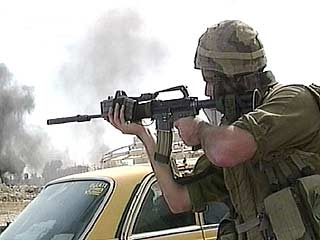 Израильские военнослужащие проводят широкомасштабную операцию в секторе Газа после того, как палестинские боевики обстреляли ракетами один из городов Израиля
