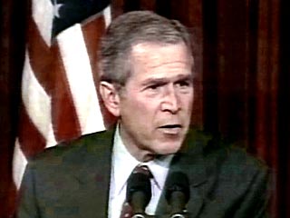 Джордж Буш выступил за больший контроль за крупными корпорациями