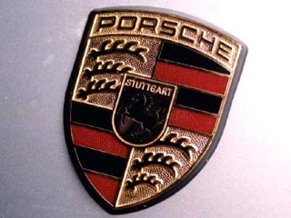 Porsche откладывает размещение акций в США